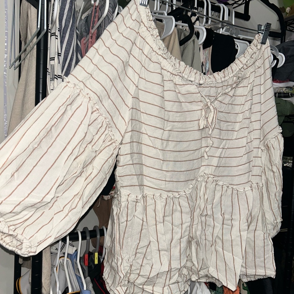 Cream Ruffled Peplum Blouse with Tie Front